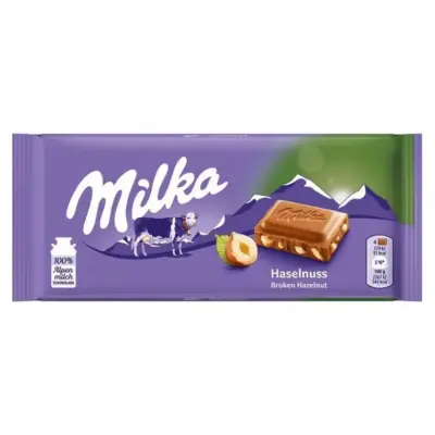 Шоколад молочний із лісовим горіхом Milka Hazelnuts Швейцарія 100 г