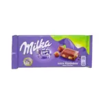 Шоколад молочний з цілим фундуком Milka Ganze Hazelnuts Швейцарія 100 г