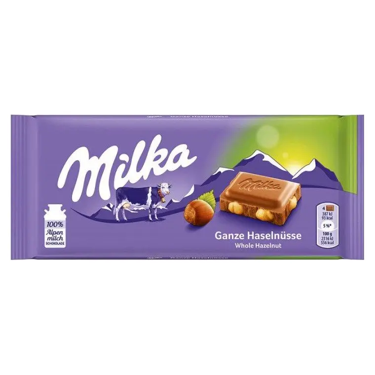 Шоколад молочний з цілим фундуком Milka Ganze Hazelnuts Швейцарія 100 г