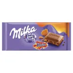 Шоколад молочний з карамеллю і мигдалем Milka Ganze Hazelnuts Швейцарія 100 г